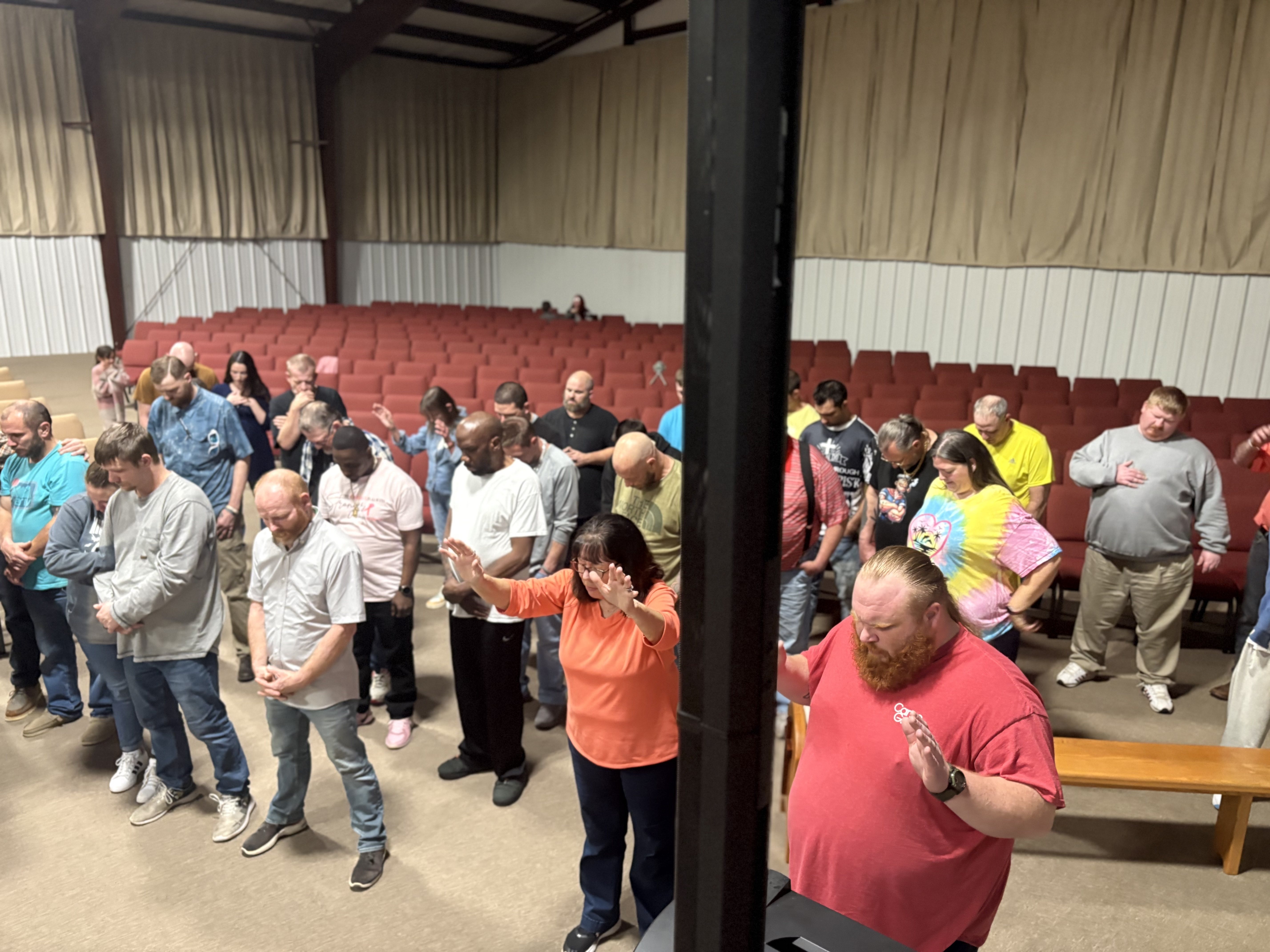 Redeemed men and women worshipping God